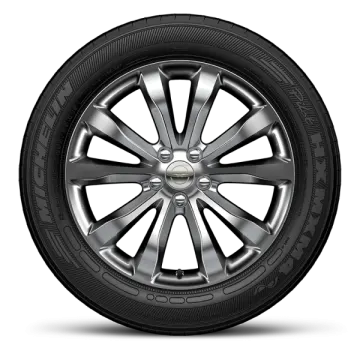 an all season tire on a white background
