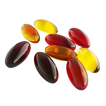 red and yellow pills on white background