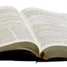 an open book on a white background