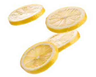 three slices of lemon on a white background