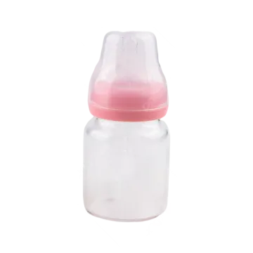 a baby bottle with a pink lid