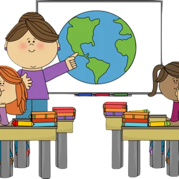 a group of children sitting at desks in front of a whiteboard