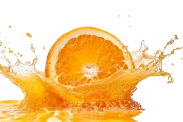 an orange is splashing into the water