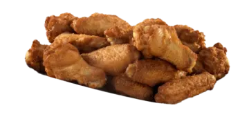 a pile of fried chicken on a white background