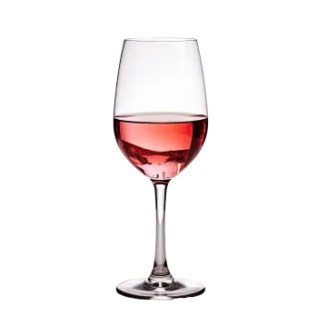 a wine glass filled with pink wine