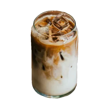 a tall glass filled with iced coffee
