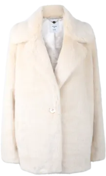 a woman wearing a white fur coat