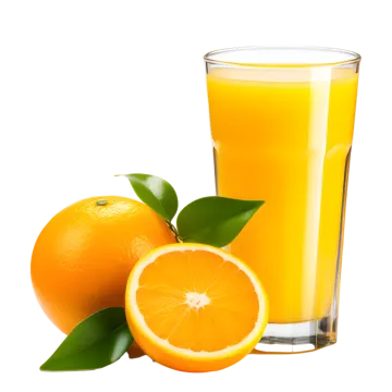 a glass of orange juice next to an orange