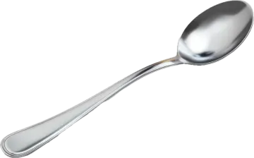 a silver spoon on a white background