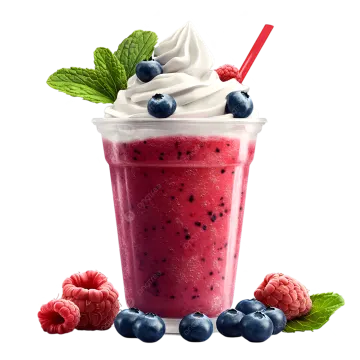 a glass filled with fruit and topped with whipped cream