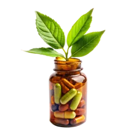 a bottle filled with pills and a green leaf