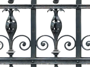 an iron fence with a bird on it