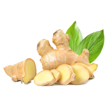 a pile of ginger root with green leaves