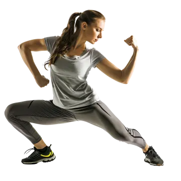 a woman in a gray shirt and black pants