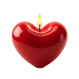 a red heart shaped candle on a white background