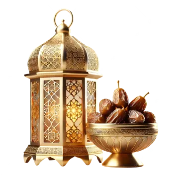 a bowl of dates next to a lit candle