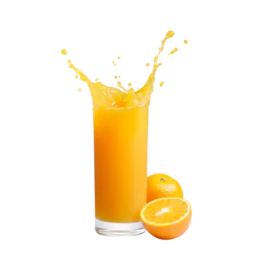 orange juice splashing into a glass