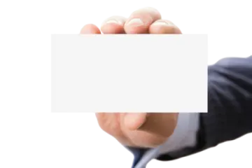 a person holding a business card in their hand