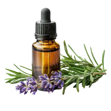 a bottle of lavender essential oil next to some lavender flowers