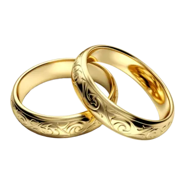 a pair of gold wedding rings