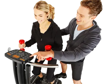 a man and woman standing on a treadmill