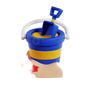a toy bucket and shovel in the sand
