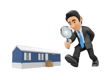 a man holding a magni and looking at a house