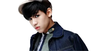 a young man in a denim jacket and hat