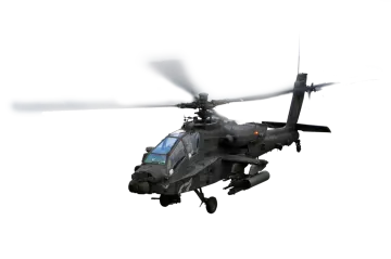 a military helicopter flying in the sky