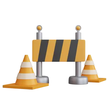 a yellow and black barrier with two cones