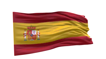 the flag of spain waving in the wind