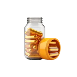 a glass jar filled with gold capsules