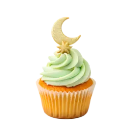 a cupcake with green frosting and a crescent