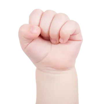 a baby's fist is shown in this image