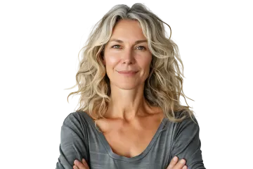 a woman standing with her arms crossed
