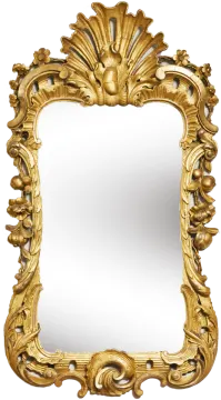 an ornate gold framed mirror