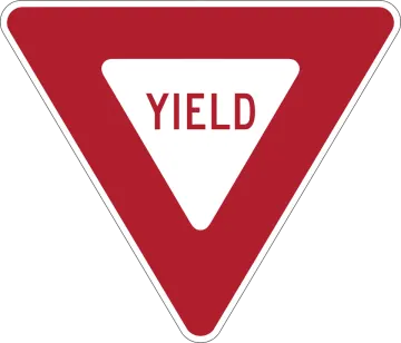 a triangle with the word yield on it