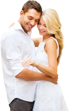 a man in a white shirt hugging a woman