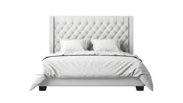 a bed with white sheets and pillows on it