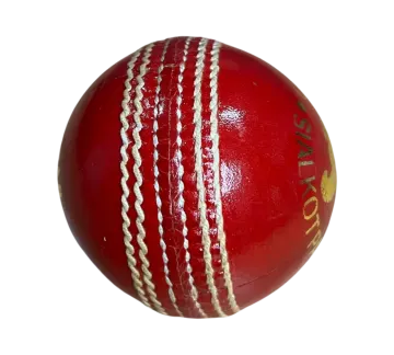 a red cricket ball on a white background
