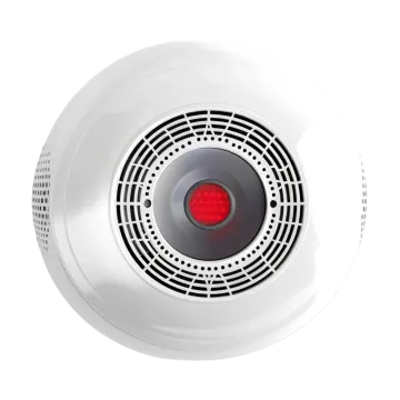 a white smoke detector with red light