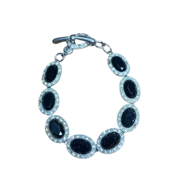 a bracelet with black and white stones