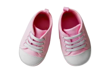 a pair of pink shoes on a white background