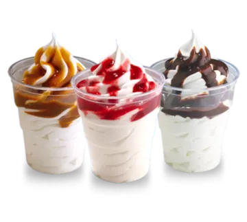 three desserts in plastic cups on a white background