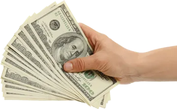 a person holding money in their hand