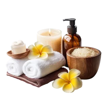 a wooden bowl filled with white towels and flowers
