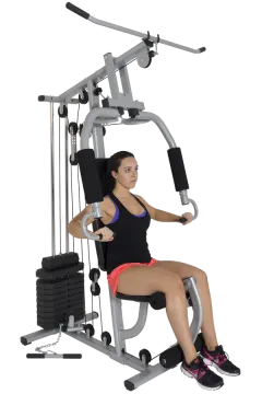 a woman is sitting on a seated bench in the gym