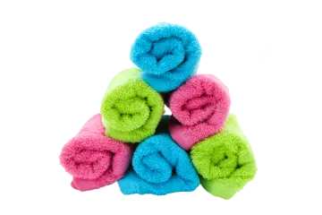 a pile of colorful towels on a white background
