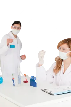 a woman wearing a white coat