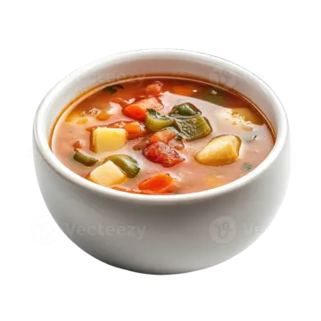 a white bowl filled with soup and vegetables